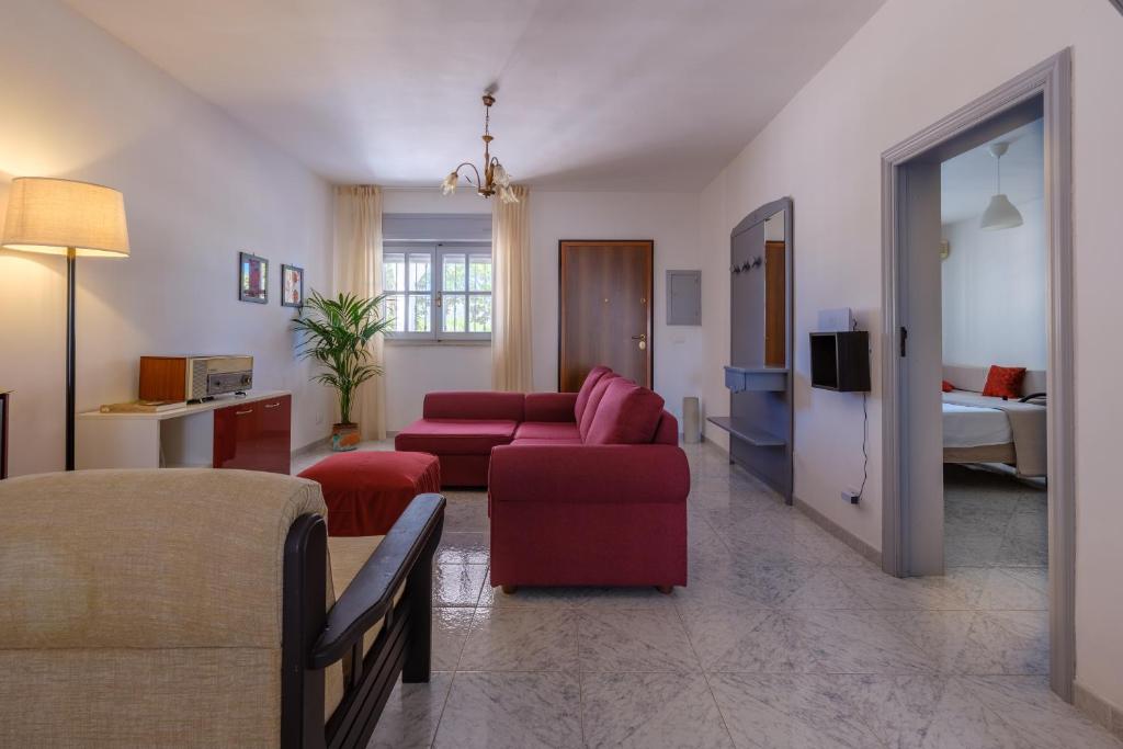 Televízia a/alebo spoločenská miestnosť v ubytovaní Villa Marinezzi