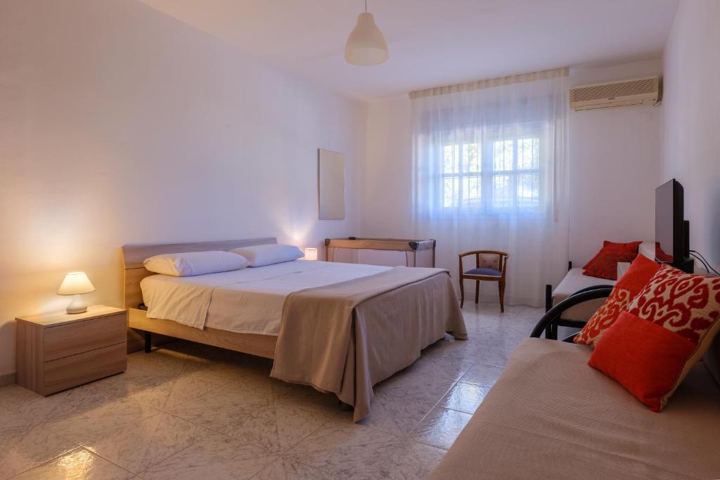 Posteľ alebo postele v izbe v ubytovaní Villa Marinezzi