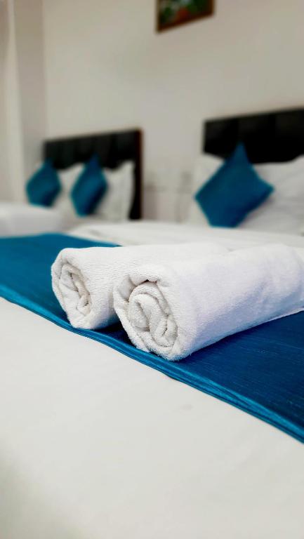 Postel nebo postele na pokoji v ubytování Hotel Season