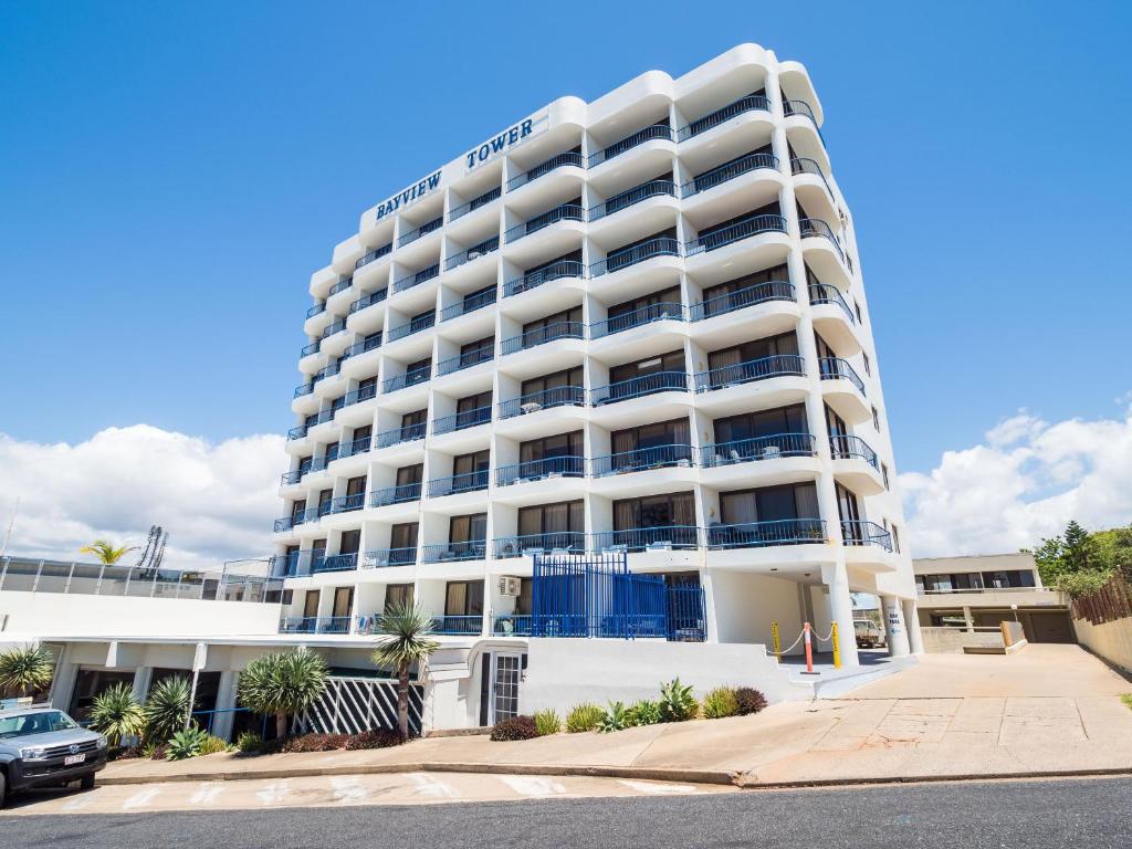 a large white building with a large window at Bayview Tower in Yeppoon