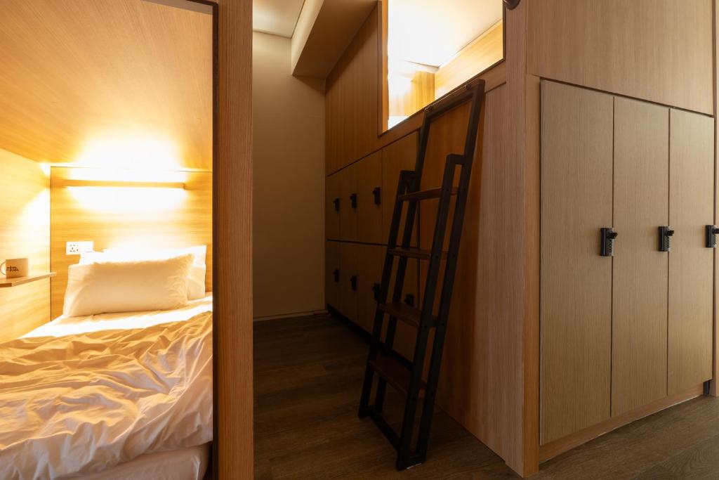Postel nebo postele na pokoji v ubytování Boro Hanok Hostel in Myeongdong