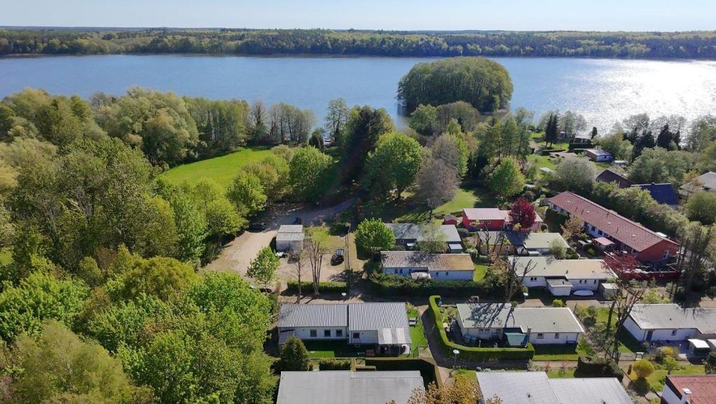 an aerial view of a small town next to a lake at Ferienhaus-Anton-Charlotte in Schwarz