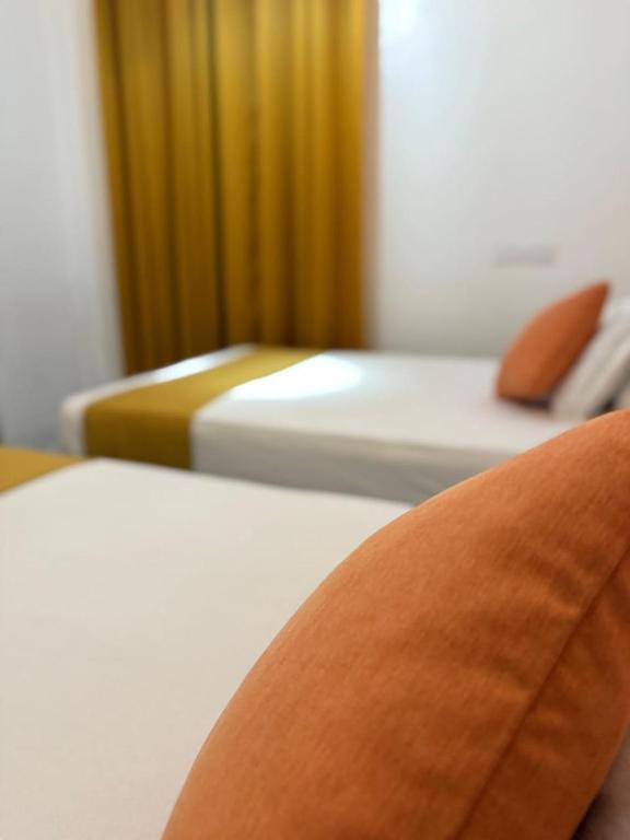 Postel nebo postele na pokoji v ubytování Thambara Resort