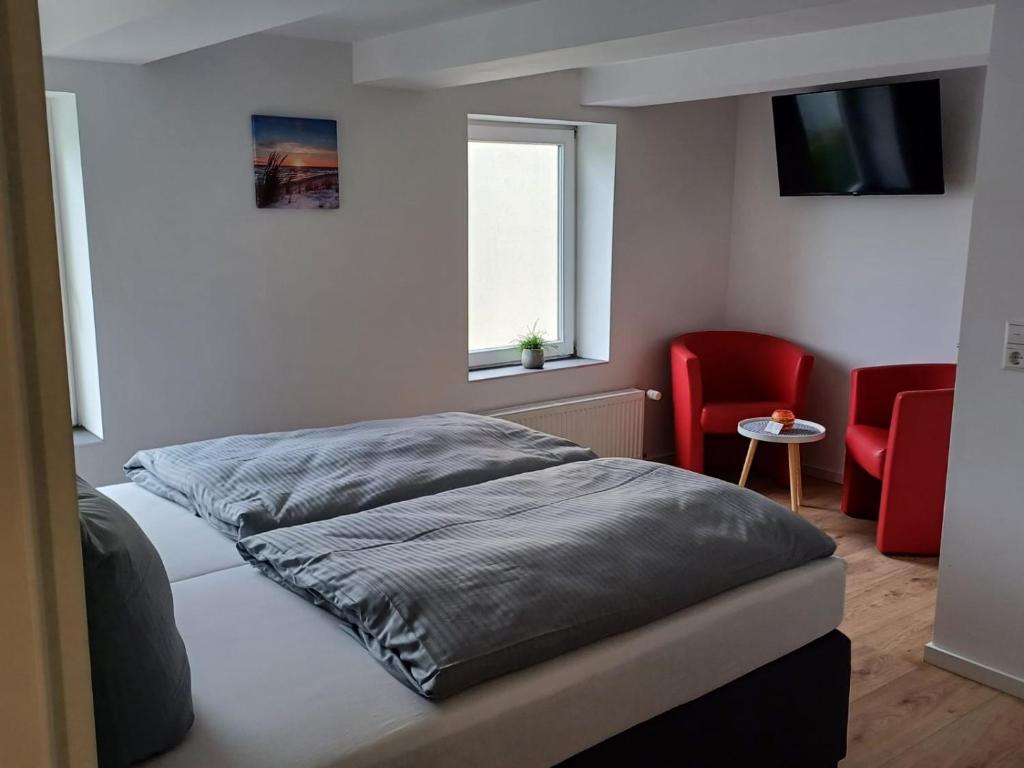 Postel nebo postele na pokoji v ubytování Motel Königslutter