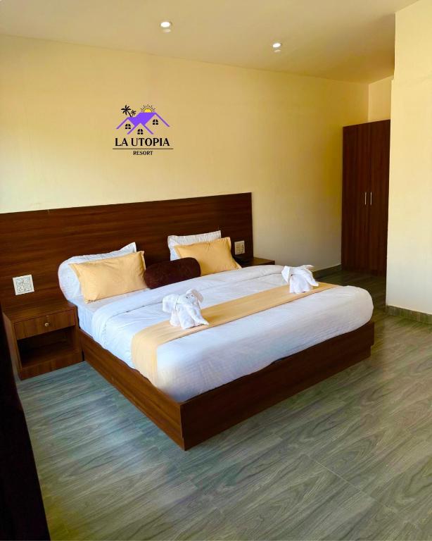 Postel nebo postele na pokoji v ubytování La Utopia Resort