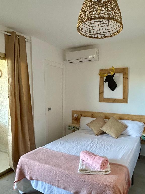 Posteľ alebo postele v izbe v ubytovaní S_Apartamento