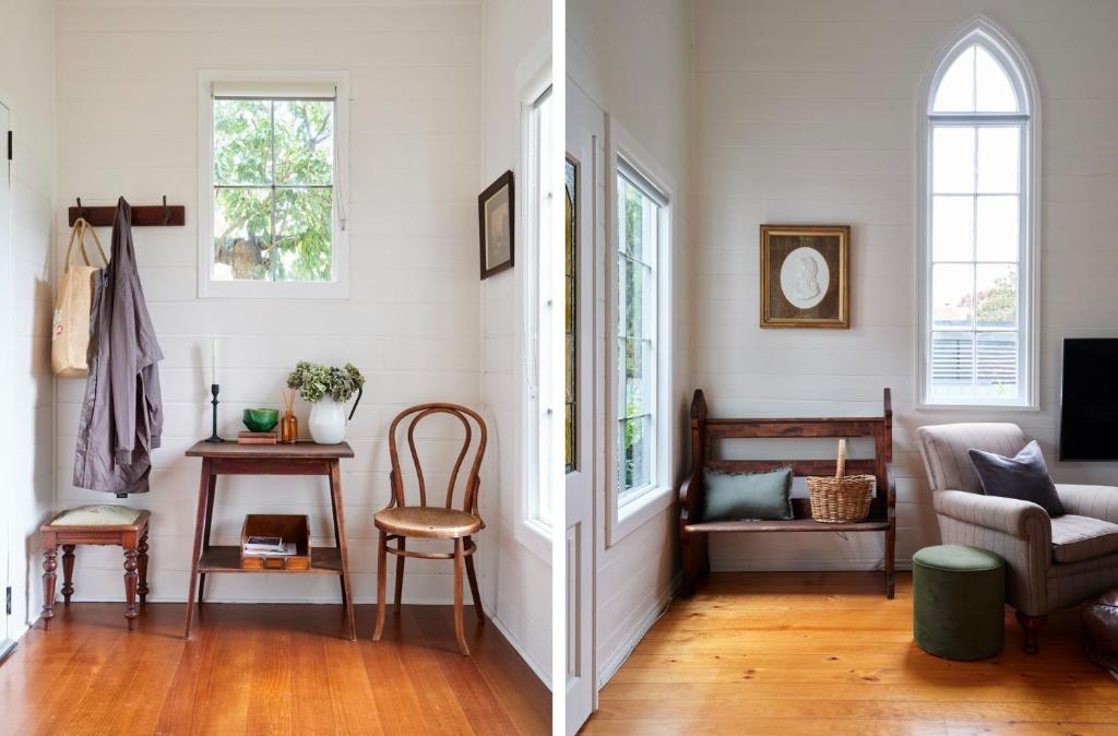 a living room with white walls and wooden floors at The Old Trentham Church in Trentham