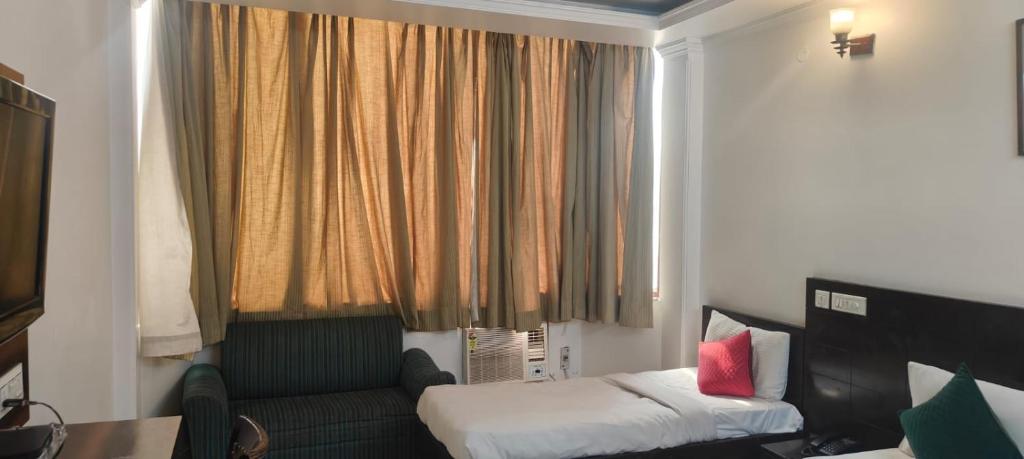 Postel nebo postele na pokoji v ubytování Hotel Fringo