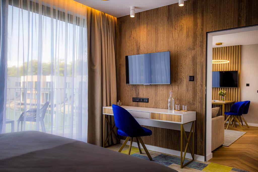 TV a/nebo společenská místnost v ubytování TILIA Resort