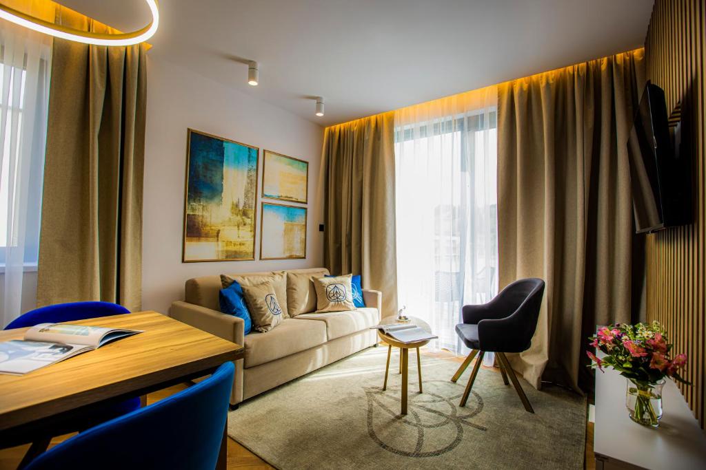 TV a/nebo společenská místnost v ubytování TILIA Resort