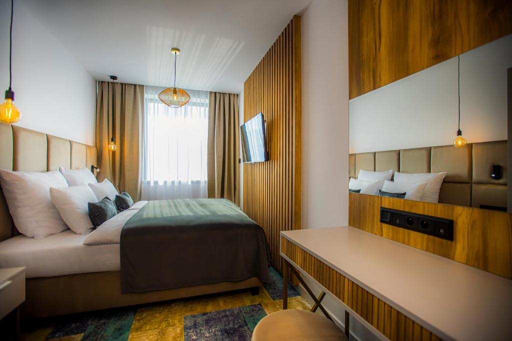 Postel nebo postele na pokoji v ubytování TILIA Resort
