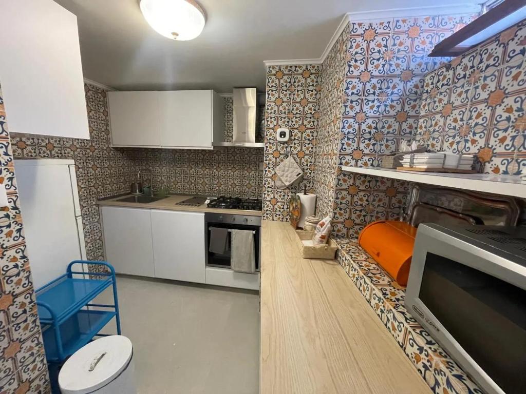 Kuchyňa alebo kuchynka v ubytovaní Comfortable Apartment in the Heart of Rome, 65m², City View