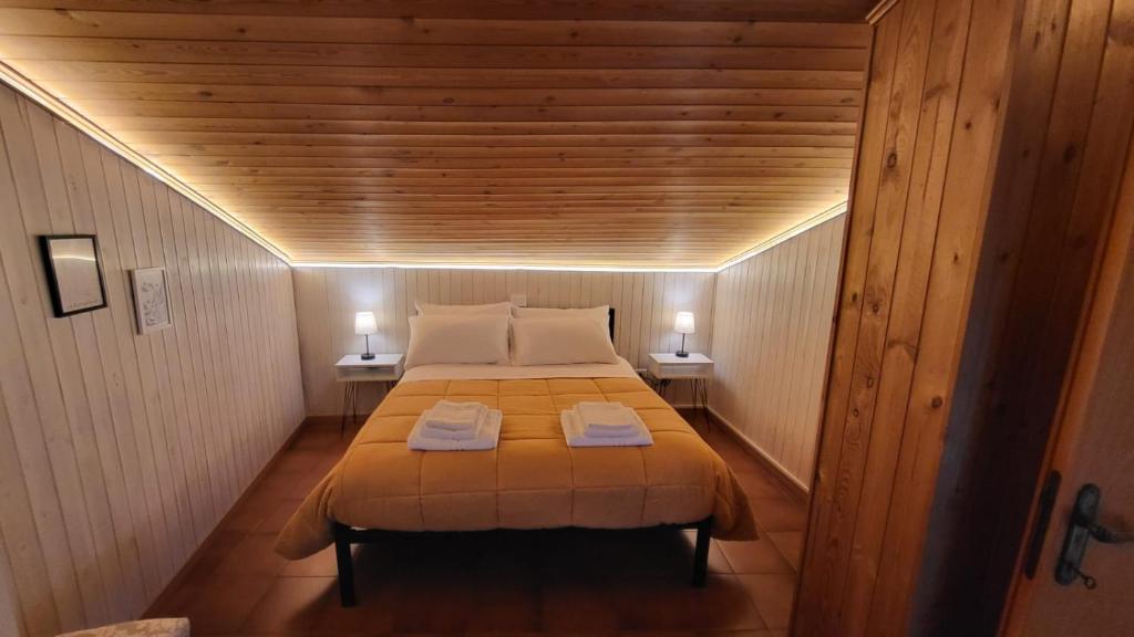 Postel nebo postele na pokoji v ubytování Dimora del falco