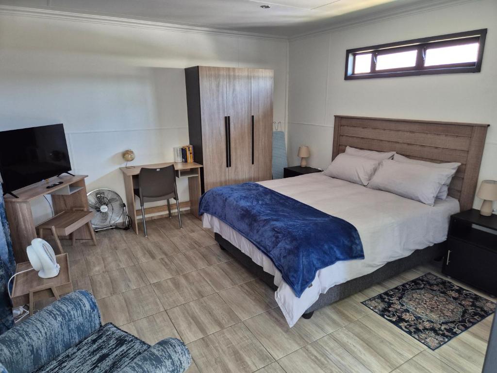 Postel nebo postele na pokoji v ubytování Wattlewood Cabins