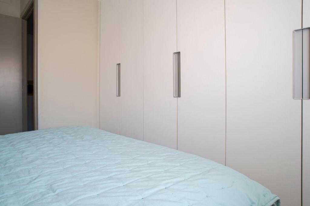 Cama o camas de una habitación en Apartaments Turístics Cardona II