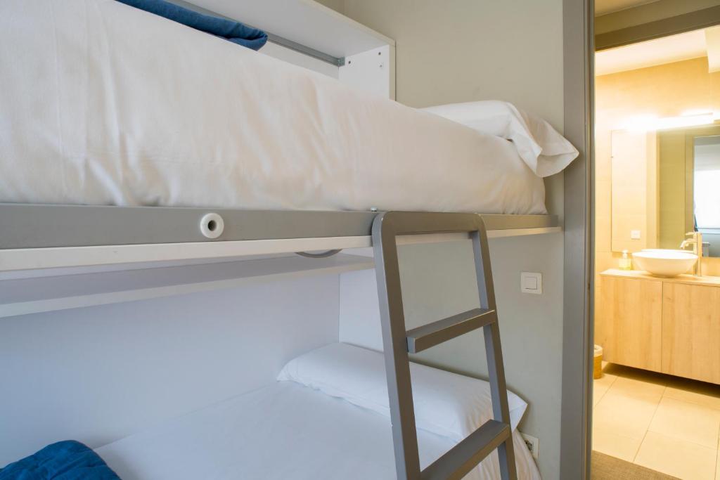 Cama o camas de una habitación en Apartaments Turístics Cardona II
