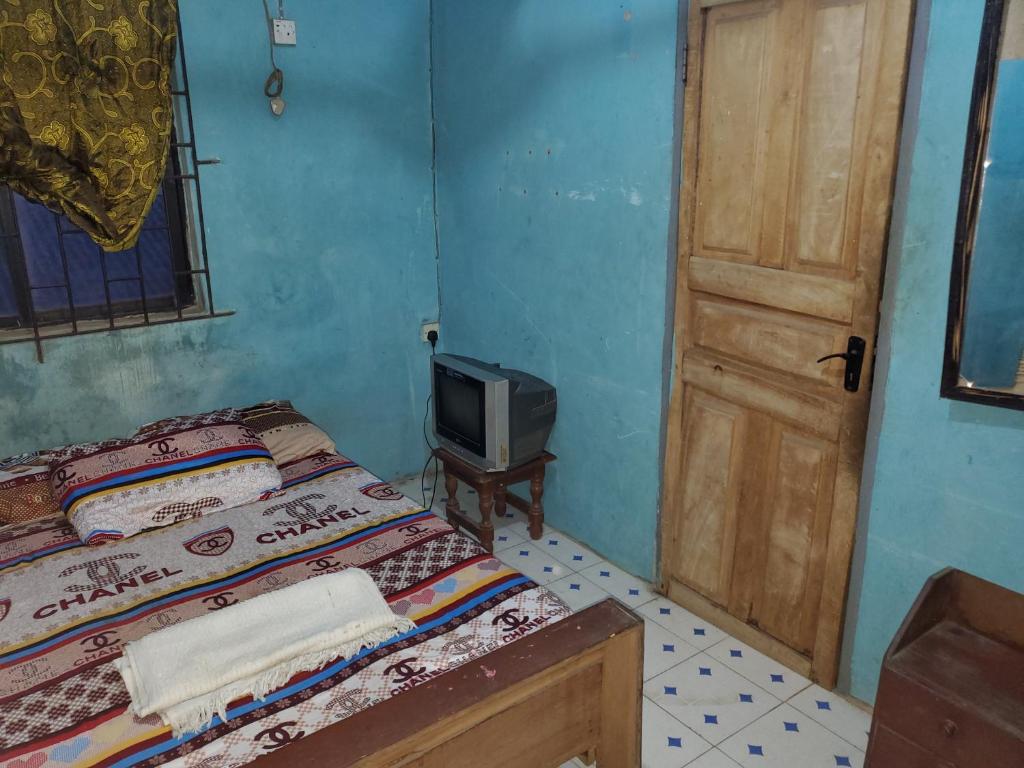 Postel nebo postele na pokoji v ubytování Zaddy Room