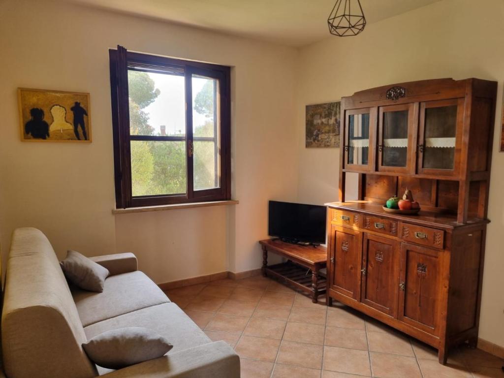 TV a/nebo společenská místnost v ubytování Agriturismo TERRANERA