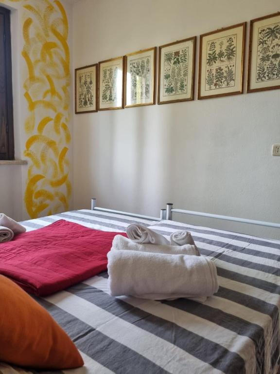 Postel nebo postele na pokoji v ubytování Agriturismo TERRANERA
