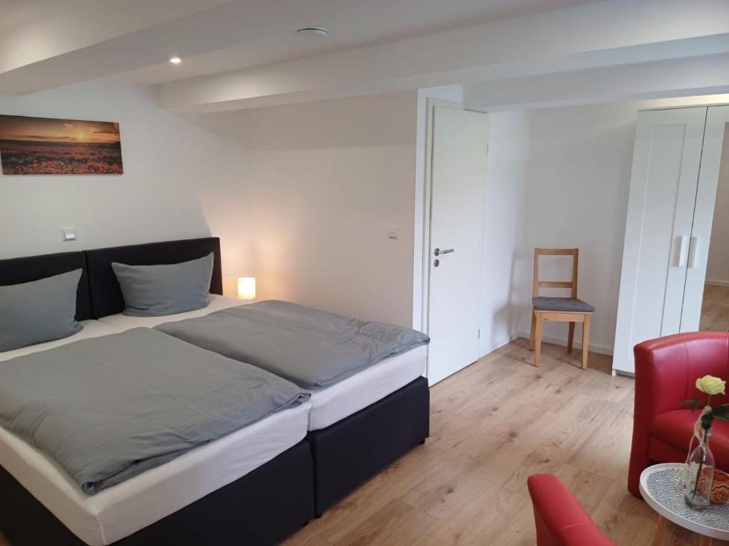 Postel nebo postele na pokoji v ubytování Motel Königslutter