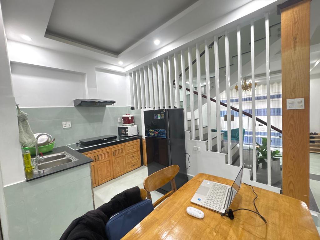 Kuchyň nebo kuchyňský kout v ubytování An Nhiên House