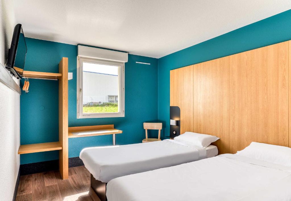 Postel nebo postele na pokoji v ubytování B&B HOTEL Pézenas