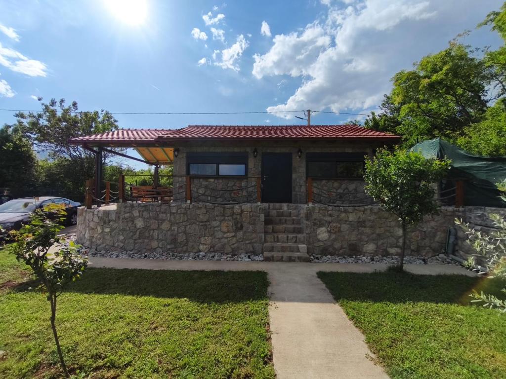 a house with a stone wall at Stone House Montenegro in Danilovgrad