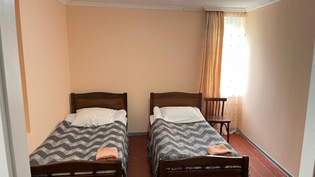 Postel nebo postele na pokoji v ubytování Ciuri's Guesthouse