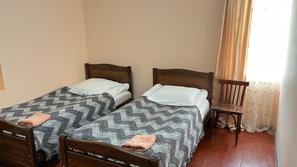 Postel nebo postele na pokoji v ubytování Ciuri's Guesthouse