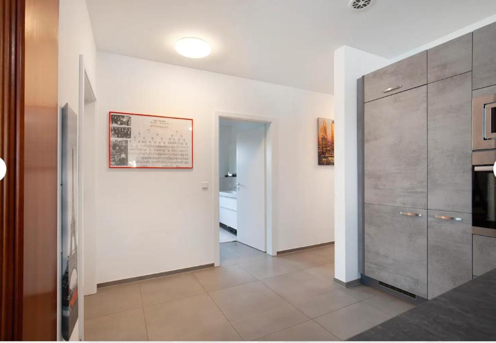 Kuchyň nebo kuchyňský kout v ubytování großzügige Unterkunft mit Terrasse