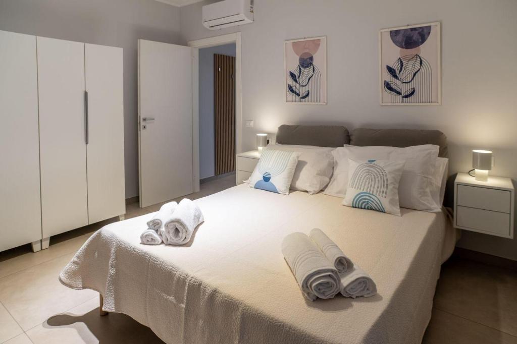 Postel nebo postele na pokoji v ubytování Ambra Apartments