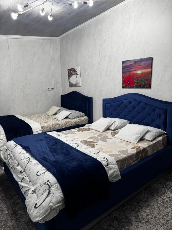 Llit o llits en una habitació de Hoteluri