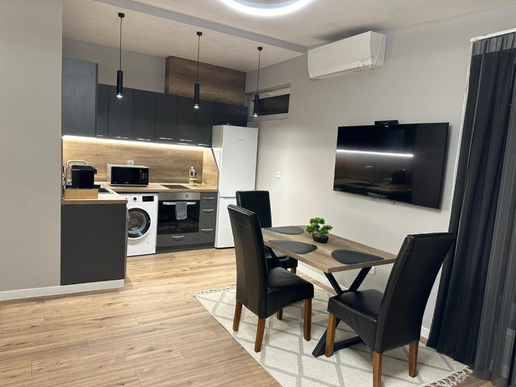 Kuchyň nebo kuchyňský kout v ubytování Vimar Apartments