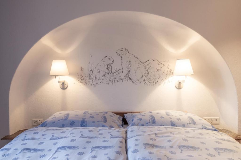 Postel nebo postele na pokoji v ubytování Hotel Privata