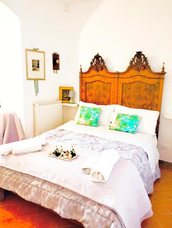 Postel nebo postele na pokoji v ubytování Central Studio in Moneglia 20 steps from beach and 20 minutes from the Cinque Terre by train