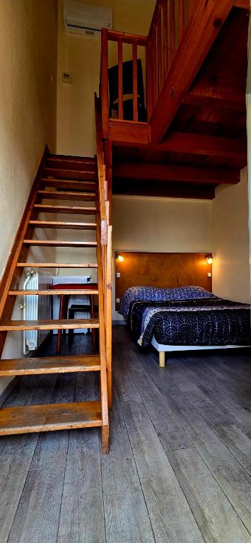Postel nebo postele na pokoji v ubytování Hotel La Reserve