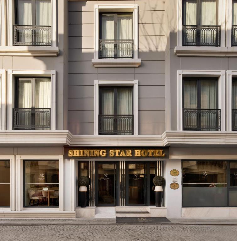 a building with a sign that reads shining star hotel at Shining Star Hotel in Istanbul