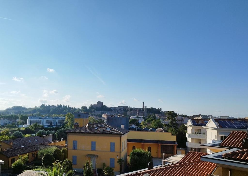 a view of a city with buildings at Appartamento La Finestra sul Borgo in Santarcangelo di Romagna