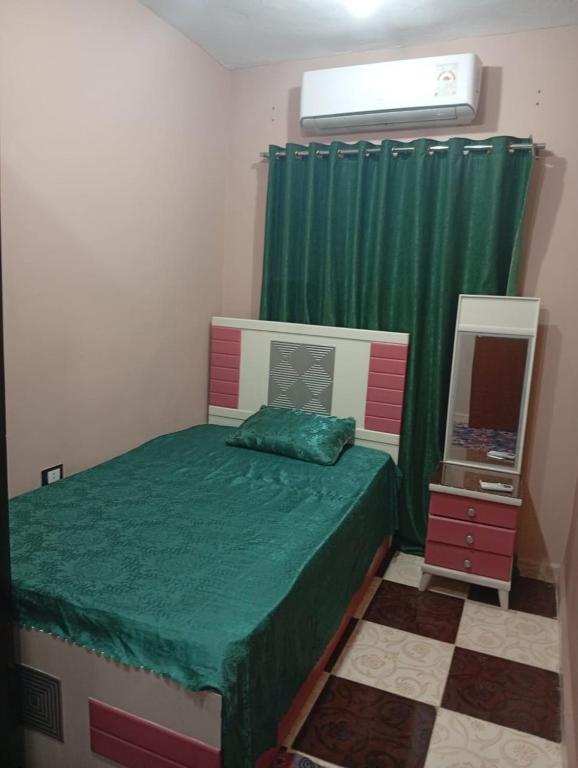 Una cama o camas en una habitación de Migo Pyramids View
