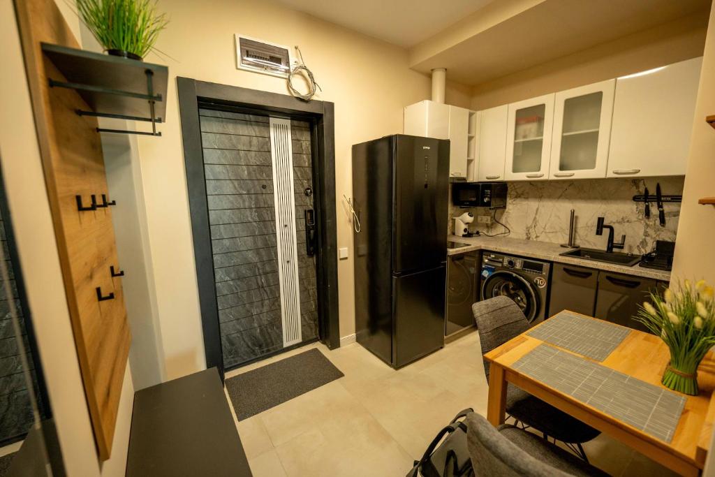Kuchyň nebo kuchyňský kout v ubytování Aqua View SPA Boutique Hotel
