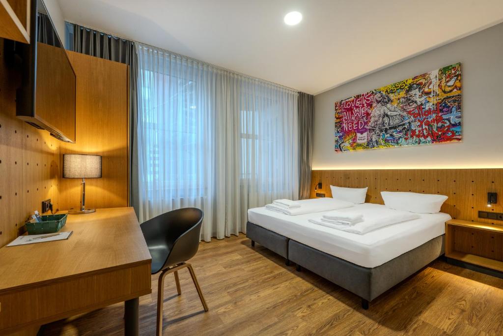 Postel nebo postele na pokoji v ubytování mk hotel berlin