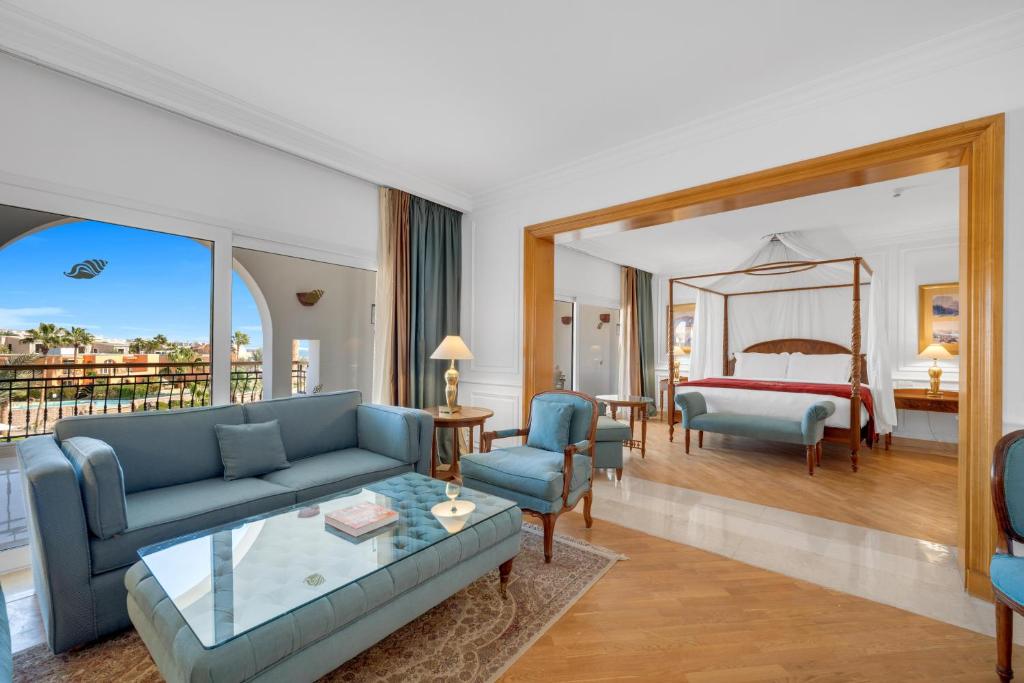 Postel nebo postele na pokoji v ubytování Savoy Sharm El Sheikh