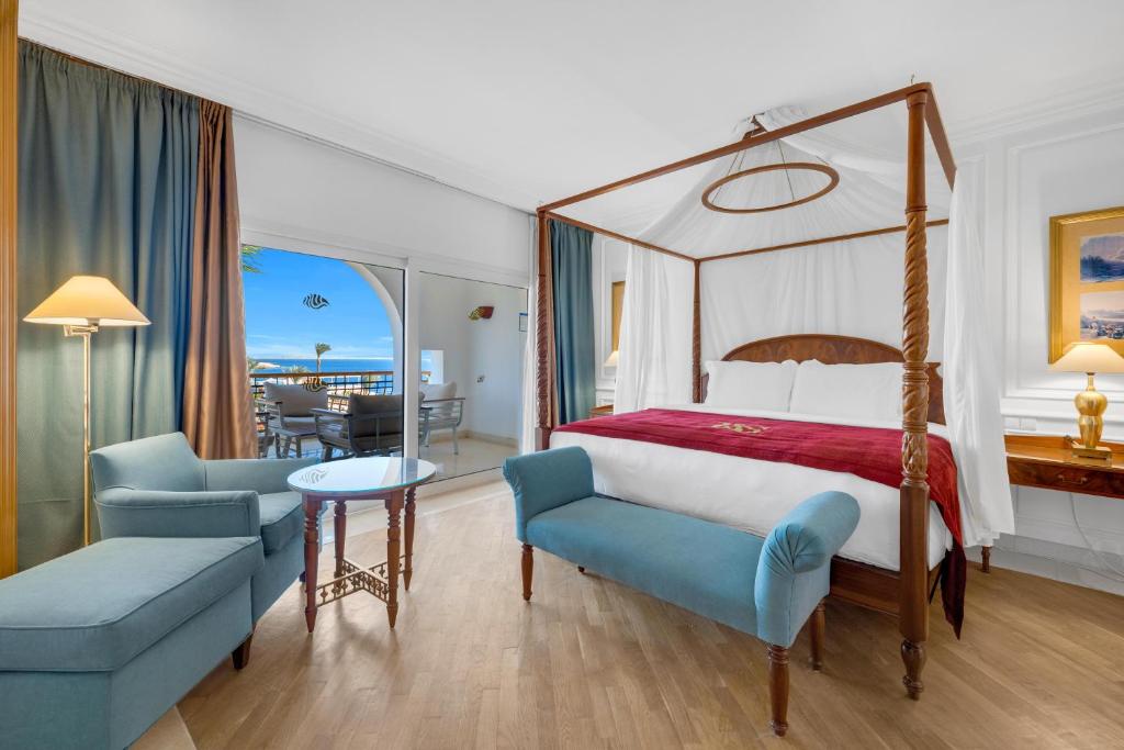 Postel nebo postele na pokoji v ubytování Savoy Sharm El Sheikh
