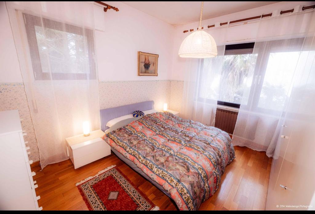 Posteľ alebo postele v izbe v ubytovaní Villa Lilli