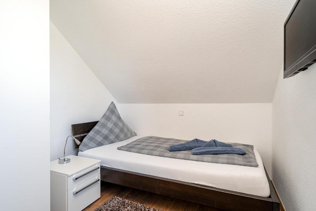 Postel nebo postele na pokoji v ubytování Fischhuus