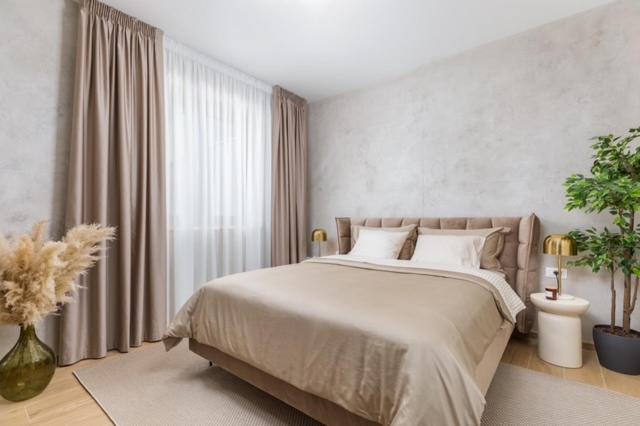 Ένα ή περισσότερα κρεβάτια σε δωμάτιο στο Lux Apartment Liburni - NEW