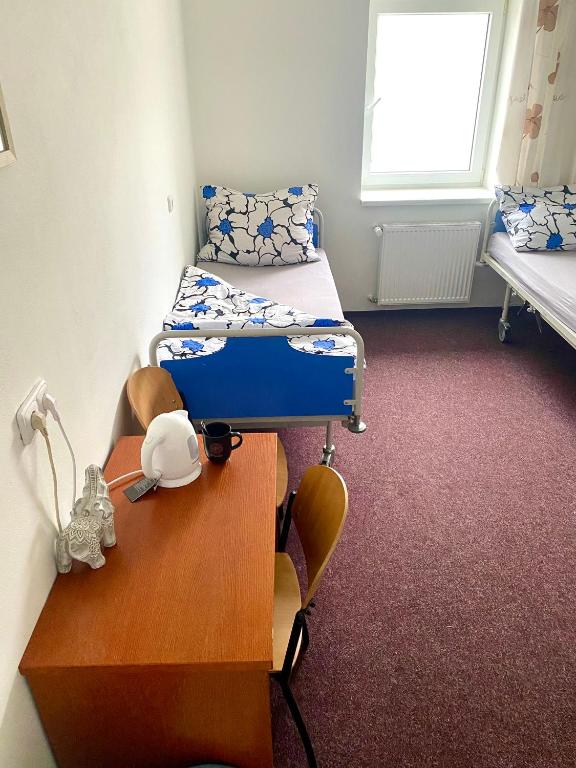 Postel nebo postele na pokoji v ubytování Ubytovna Kaplice