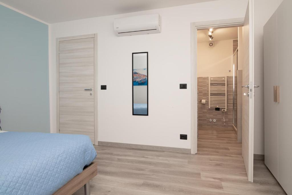 Postel nebo postele na pokoji v ubytování gabry acquarium rooms