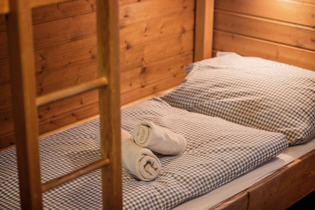Postel nebo postele na pokoji v ubytování Die Schlickeralm