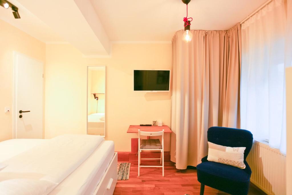 Postel nebo postele na pokoji v ubytování Elisabeth Apartments